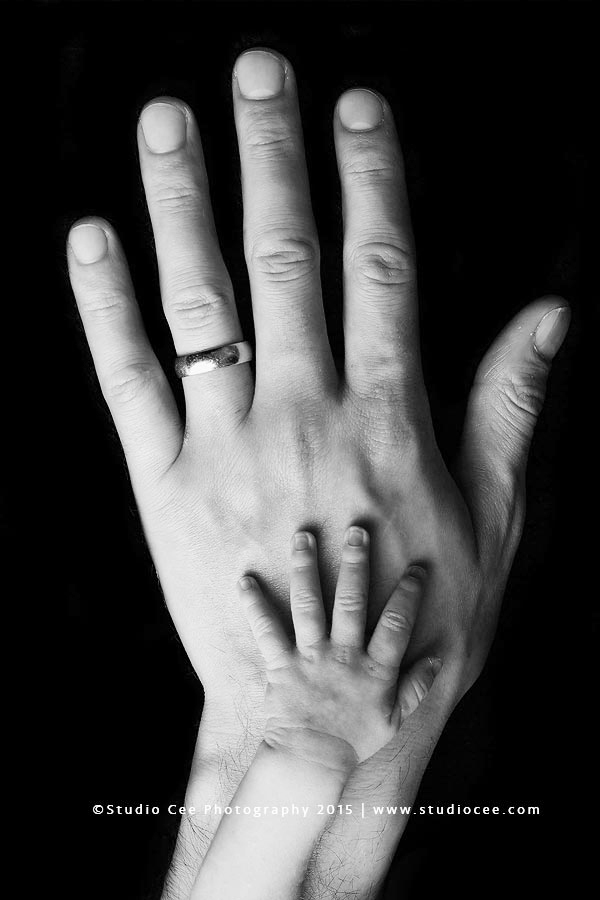 newbornanddaddyhand